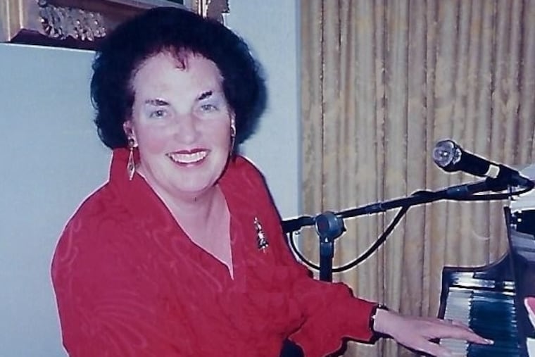 Dr. Cellucci enjoyed sign-alongs at the piano during Christmas parties.