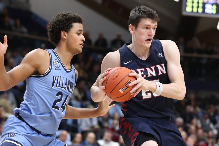 JJeremiah Robinson-Earl, left, of Villanova guards AJ Brodeur of Penn on Dec. 4, 2019 at the Finneran Pavilion at Villanova University