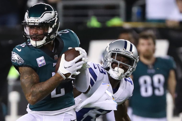 Eagles cornerback Darius Slay intercepts a pass intended for Cowboys wide receiver Michael Gallup during the second quarter at Lincoln Financial Field.