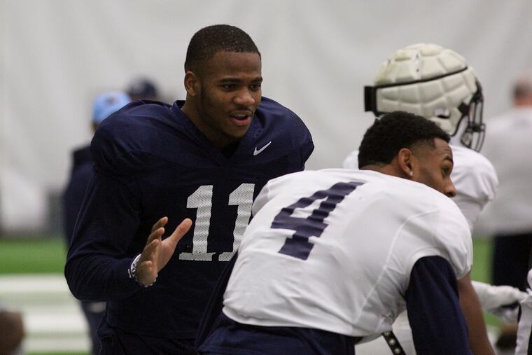 Penn State football linebacker Micah Parsons (11) and running back Journey Brown (4) during practice on Dec. 20, 2019.