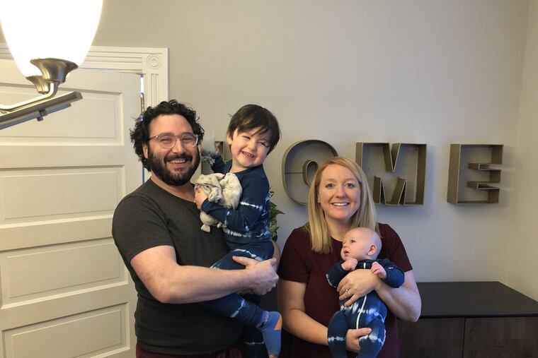 Jason and Haley Hellmann with kids Eli (left) and Louie, born in the midst of the pandemic.