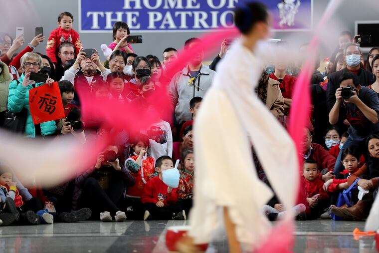Members of a children and youth class on folk dancing perform “Celebrate the New Year” during the Main Line Chinese Cultural Center's annual Chinese New Year Celebration at Great Valley High School in Malvern on Sunday.