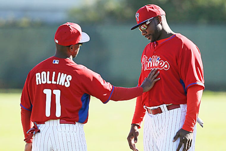 Phillies shortstop Jimmy Rollins and first baseman Ryan Howard. (Charlie Neibergall/AP)