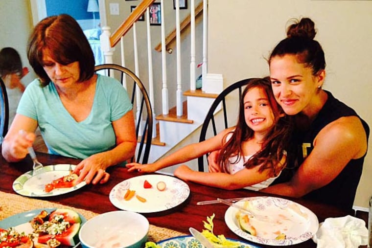 Katie Hayek having a healthy lunch with a niece, Adelaide Egle, and her mother, Joann. (Melissa Dribben/Staff)