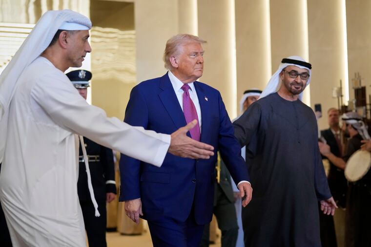 United Arab Emirates President Sheikh Mohammed bin Zayed Al Nahyan (right) greets President Donald Trump at Abu Dhabi International Airport on Thursday.