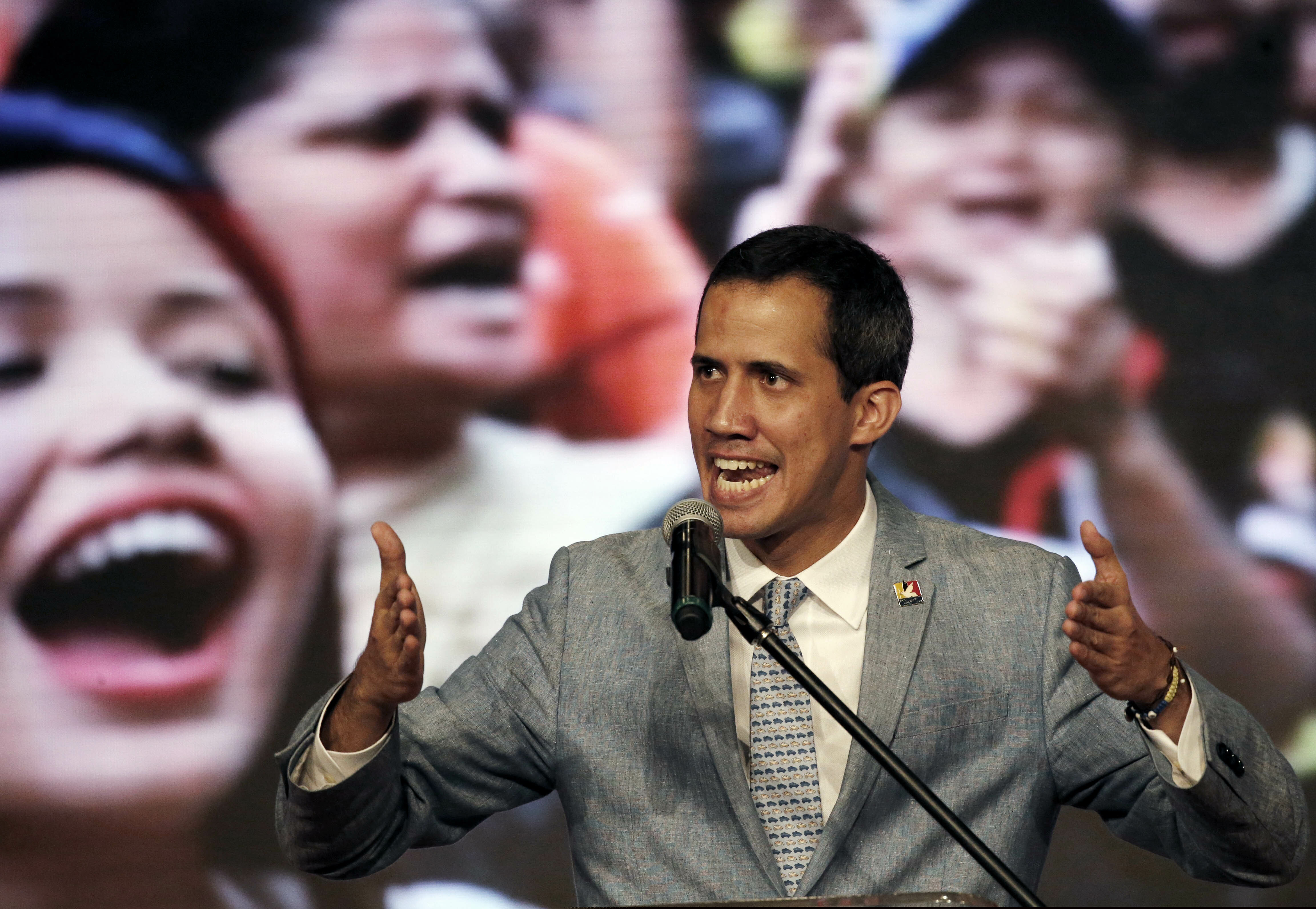 Venezuela's self-proclaimed president Juan Guaido speaks during a meeting with university students at the Central University of Venezuela, in Caracas, Venezuela, Friday, Feb. 8, 2019. Guaido declared himself interim president in Venezuela, a move recognized by several dozen countries, but President Nicolas Maduro is refusing to relinquish power.