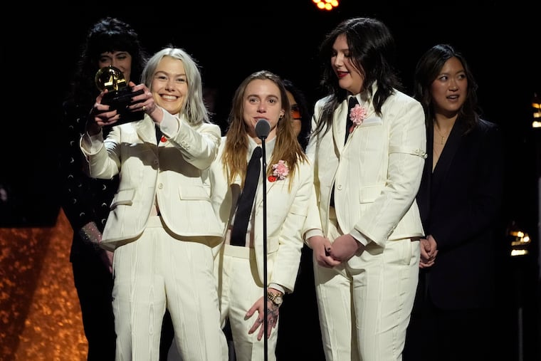 Phoebe Bridgers (from left),Julien Baker, and Lucy Dacus, of boygenius, accept a Grammy award during the 66th annual Grammy Awards on Sunday in Los Angeles.