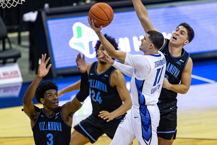 Creighton guard Marcus Zegarowski making a layup against Villanova forward Brandon Slater (3), forward Jeremiah Robinson-Earl (24), and guard Collin Gillespie (2) in the second half Saturday.