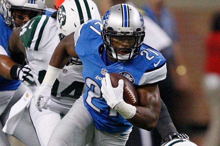 Detroit Lions running back Ameer Abdullah (21) evades a tackle from New York Jets free safety Calvin Pryor (25) during the first quarter of a preseason NFL football game at Ford Field.