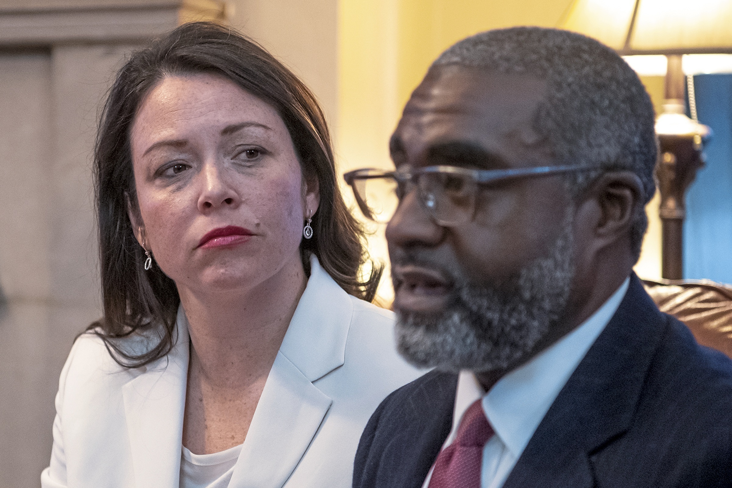 FILE - This March 9, 2019, file photo shows Pennsylvania's Allegheny County Controller Chelsa Wagner and her husband Khari Mosley speaking about their encounter with police while on a trip to Detroit, in their home, in Pittsburgh. Wagner, an elected official from Pittsburgh, and her husband have been charged following an altercation with police in a downtown Detroit hotel. The Wayne County prosecutor’s office says Wednesday, March 20, 2019, that 41-year-old Wagner faces felony resisting police and misdemeanor disorderly conduct charges. Wagner’s 50-year-old husband, Mosley, is charged with disorderly conduct and disturbing the peace -- both misdemeanors. (Alexandra Wimley/Pittsburgh Post-Gazette via AP)