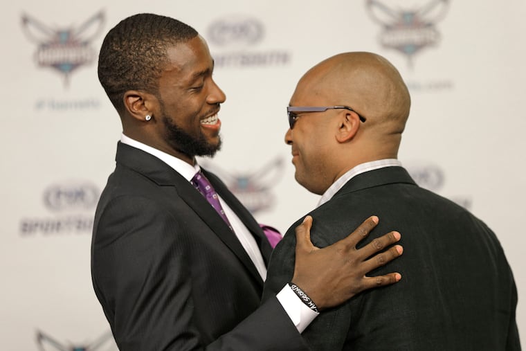 Michael Kidd-Gilchrist hugs William Wesley after the current Dallas Mavericks forward signed a four-year, $52 million contract with Charlotte in 2015. Wesley, a Pennsauken High grad, was named the New York Knicks' executive vice president/senior basketball adviser on Wenesday.