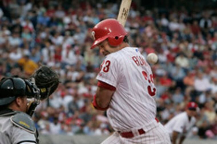 Aaron Rowand gets hit by a pitch to load the bases and allow the Phillies to get their first run after the next batter was walked.