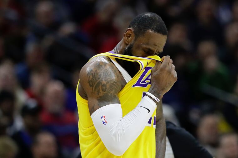 Lakers forward LeBron James during a game against the Sixers in January. James may or may not be vaccinated and has been cagey about answering the question every time he has been asked it.