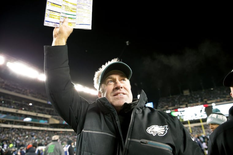 Head coach Doug Pederson celebrates after the Eagles’ 15-10 playoff win over the Atlanta Falcons Saturday.