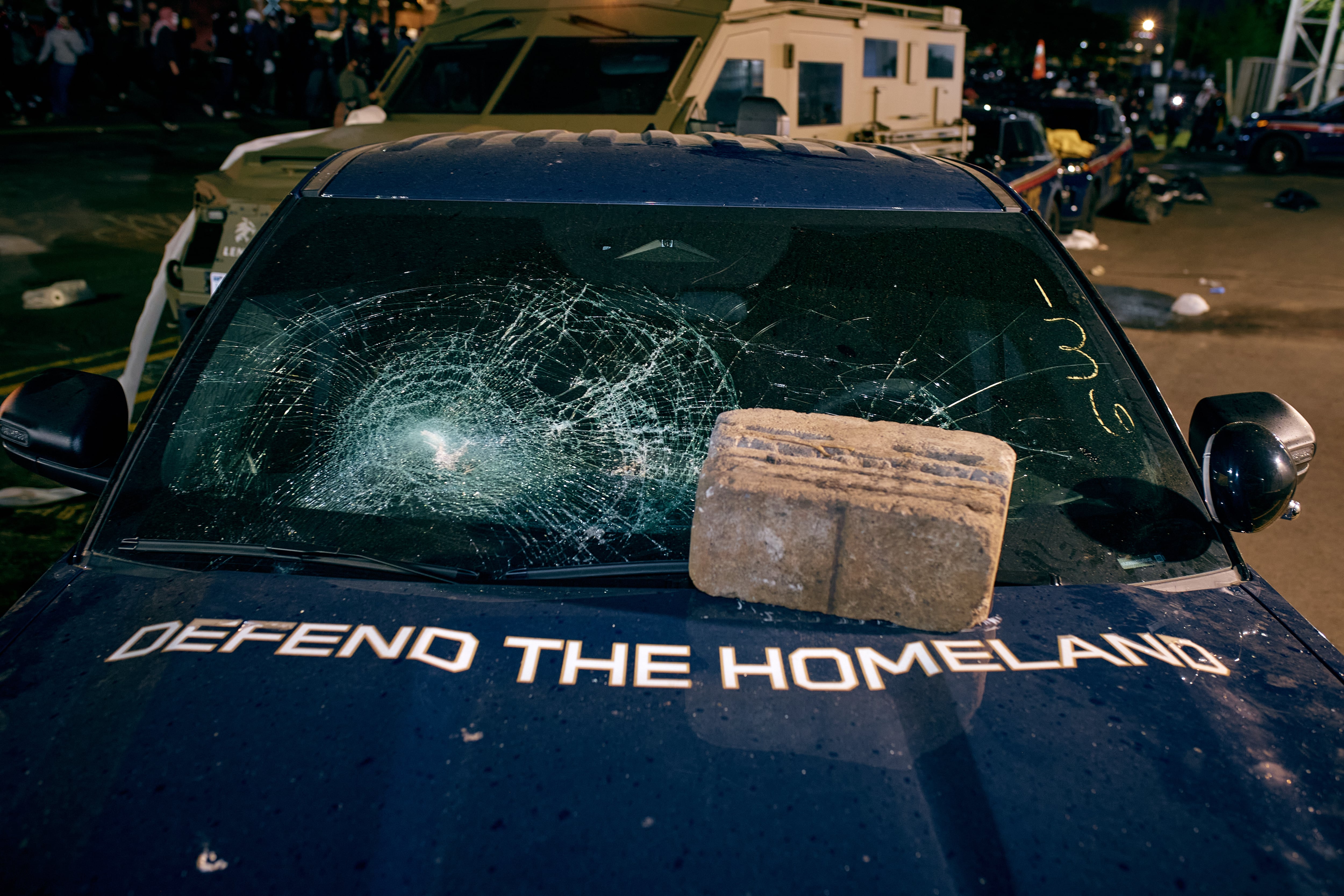 Photos show protestors and ICE agents clashing outside a New Jersey detention center