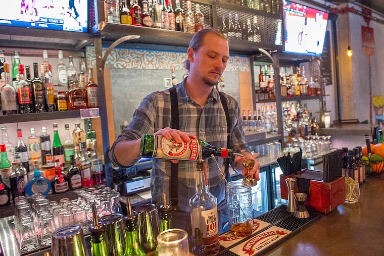 Philip Search behind the bar at Banh Mi & Bottles.