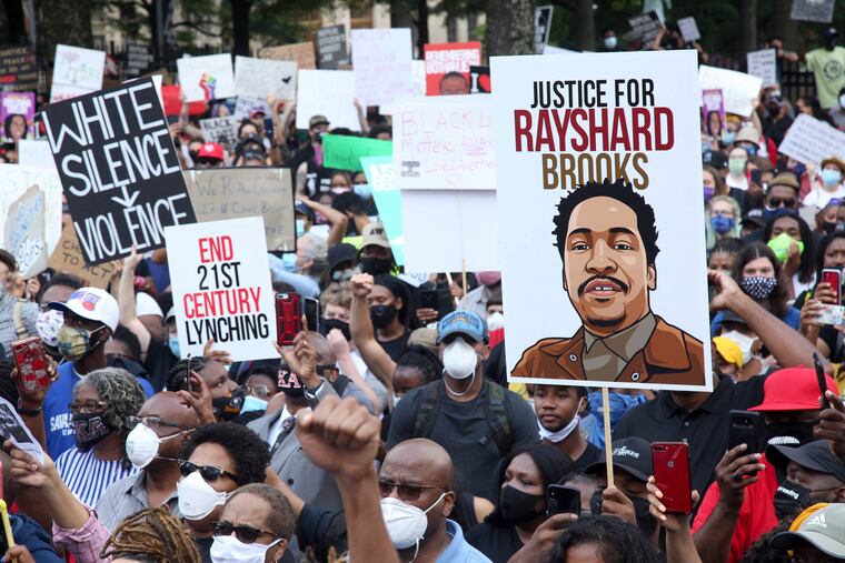 A crowd of demonstrators marches to the Capitol on Monday in Atlanta. The NAACP March to the Capitol coincided with the restart of the Georgia 2020 General Assembly.