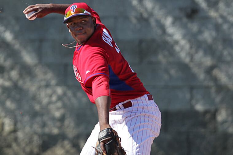 Maikel Franco throws after he fields a grounder during spring training. (David Maialetti/Staff Photographer)