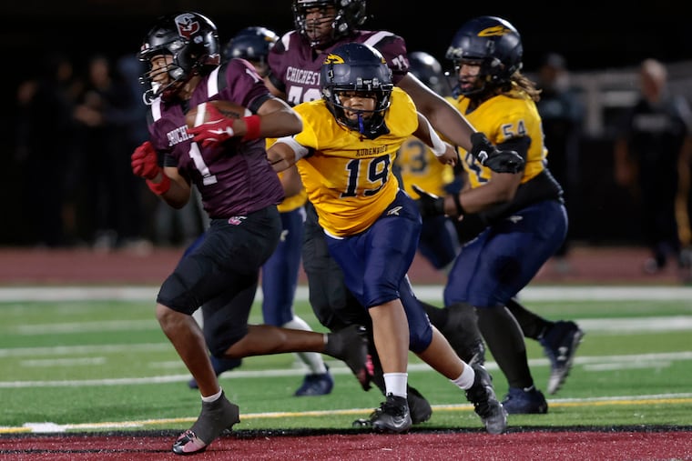 Chichester High School’s Will Bronson (1) eludes Universal Audenried Charter High School’s Khalif Moore (19) during a varsity football game in Boothwyn on Aug. 28. Players at all levels — from scholastic sports to the pros — should be mindful of their spinal health, writes Alexander R. Vaccaro.