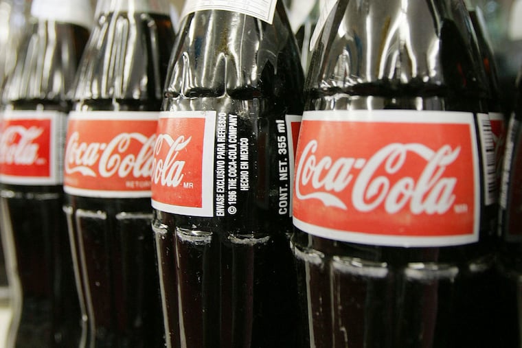 Bottles of Mexican Coca-Cola at the Tarascas Latino Supermarket in Lawrenceville, Ga., in 2004. Coca-Cola imports the drink from Mexico, which uses cane sugar, for U.S. fans.