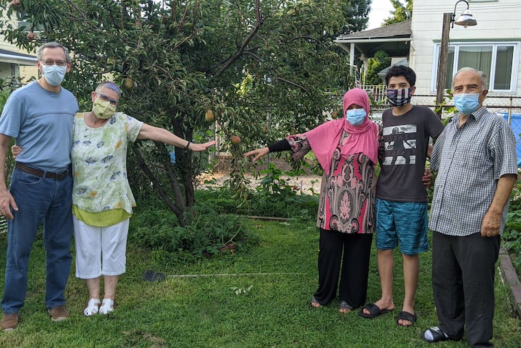Friends Mounera Ayoub and Sharon Ritz have hardly seen each other in person since March. This photo, taken by Sharon's son, was one brief exception
Left to right: Sharon's husband, Steven, Sharon, Mounera, Mounera's son Malek and her husband, Mohammed.