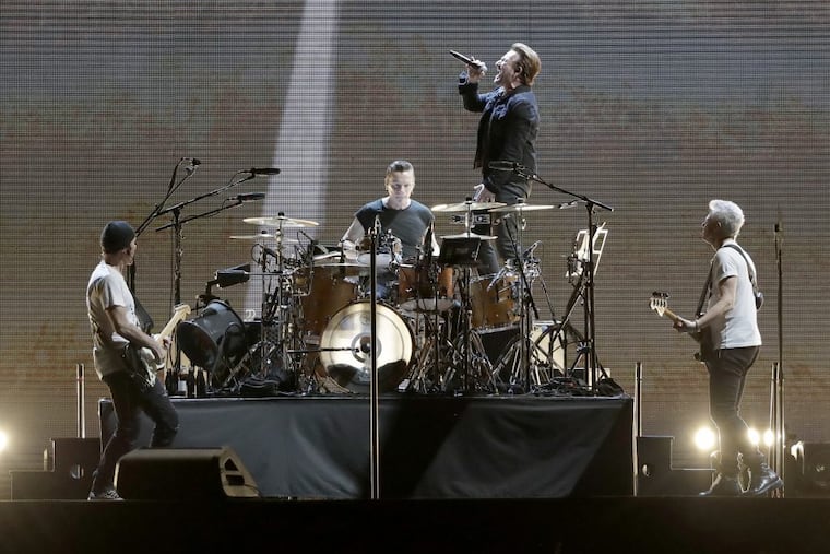 U2, with The Edge at left, performs during the Joshua Tree Tour 2017 at Lincoln Financial Field in South Philadelphia on Sunday, June 18, 2017.