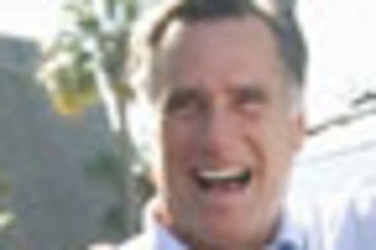 Republican presidential candidate, former Massachusetts Gov. Mitt Romney, accompanied by aide Garrett Jackson, left, and others, waves as he campaigns at Pioneer Park in Dunedin, Fla., Monday, Jan. 30, 2012. (AP Photo/Charles Dharapak)