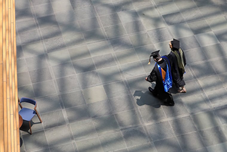 Participants in Thomas Jefferson University’s commencement make their way through the Kimmel Center last year.