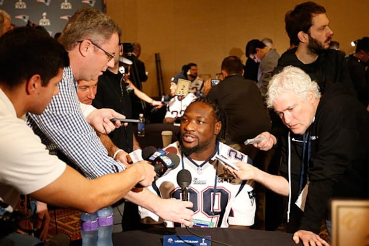 New England Patriots running back LeGarrette Blount (29) answers questions during a press conference at Chandler Wild Horse Pass. (Matthew Emmons/USA Today)