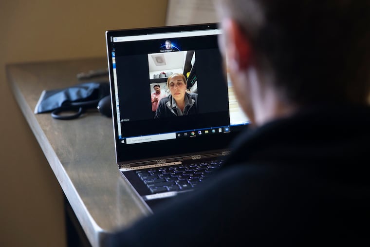 Dr. Ryan Klitgaard (right) speaks with a patient during a telemedicine appointment online at the MaxHealth Family, Internal & Sports Medicine clinic in Colleyville, Texas, on Friday, March 20, 2020. (Lynda M. Gonzalez/The Dallas Morning News/TNS)