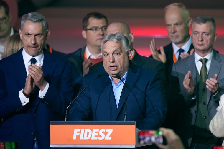 Hungary's Prime Minister Viktor Orbán (center), makes an address after the parliamentary election in Budapest, Hungary, Sunday, April 12, 2026. The far-right ally of President Trump and Russian President Vladimir Putin conceded defeat.