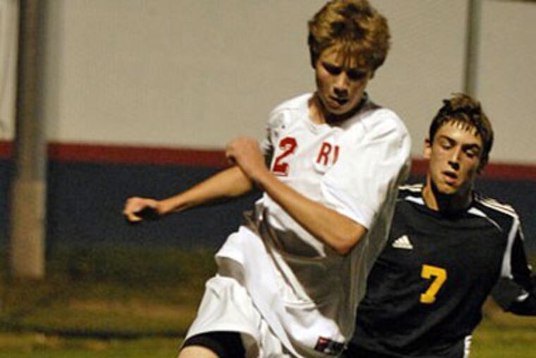 Rancocas Valley's Bobby Spracklin (left) and Moorestown's Mike Bass compete earlier this month. Both of their soccer teams will be playing in state semifinal games. (Ron Tarver / Staff Photographer)