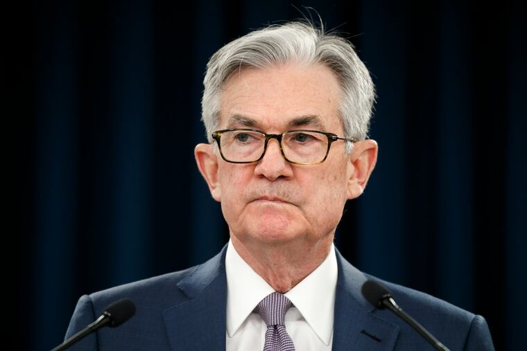 Federal Reserve Chair Jerome Powell pauses during a news conference in Washington in March 2020. The Federal Reserve says it will buy short-term loans from banks and companies to support the flow of credit as the economy grinds to a halt amid the viral outbreak. The Fed is reviving a program that it first used during the 2008 financial crisis to unclog a short-term lending market for what is known as “commercial paper.”