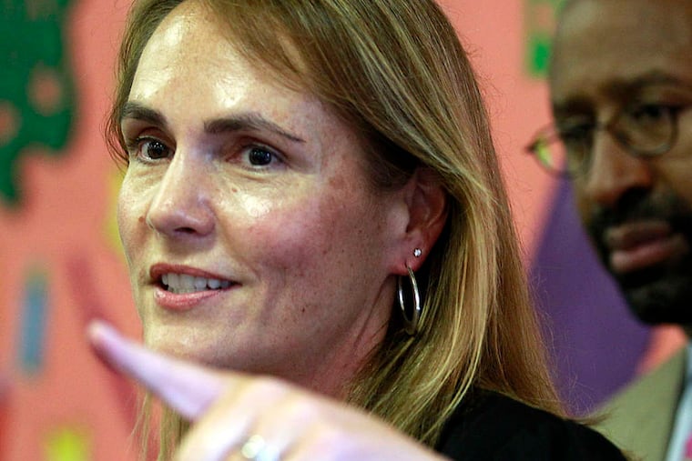 YONG KIM / STAFF PHOTOGRAPHER DHS Commissioner Anne Marie Ambrose, seen in 2012 with Mayor Nutter, is leaving.