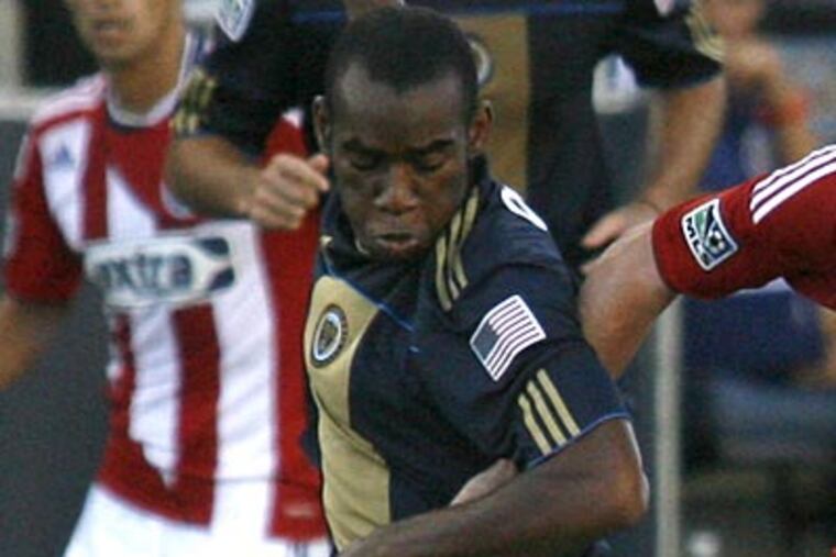 Amobi Okugo replaced Brian Carroll after he strained a hamstring against the Red Bulls. (H. Rumph Jr/AP file photo)