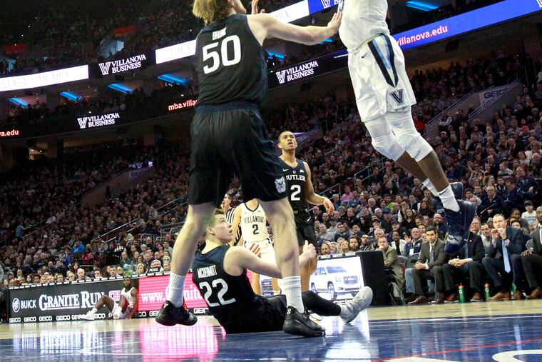 Saddiq Bey of Villanova dunks over Joey Brunk of Butler during their game on March 2.