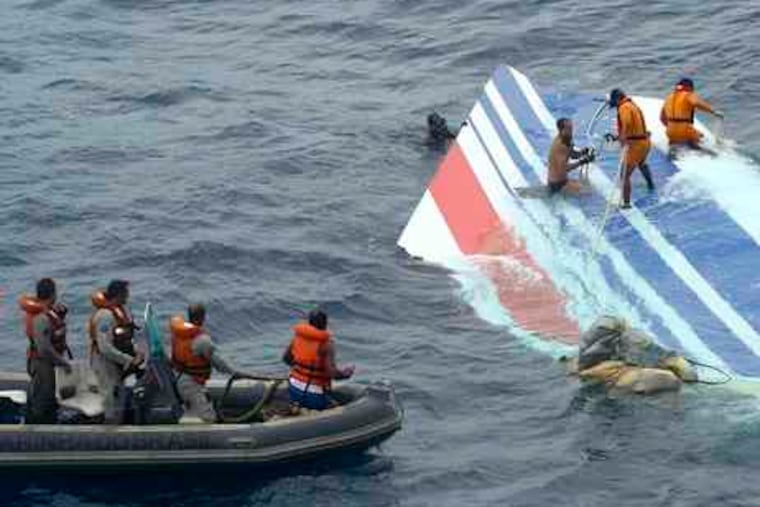 A large tail section from the Air France jet that crashed last week is recovered from the Atlantic Ocean bythe Brazilian navy. Authorities also said eight more bodies were found yesterday, raising the number to 24 since the jet crashed May 31 en route from Rio de Janeiro to Paris with 228 aboard. Story and photo on A2.
