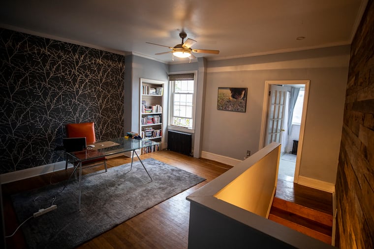 The second floor of the 20th-century rowhouse has Joshua Morrow's office space, along with a bedroom and bathroom.