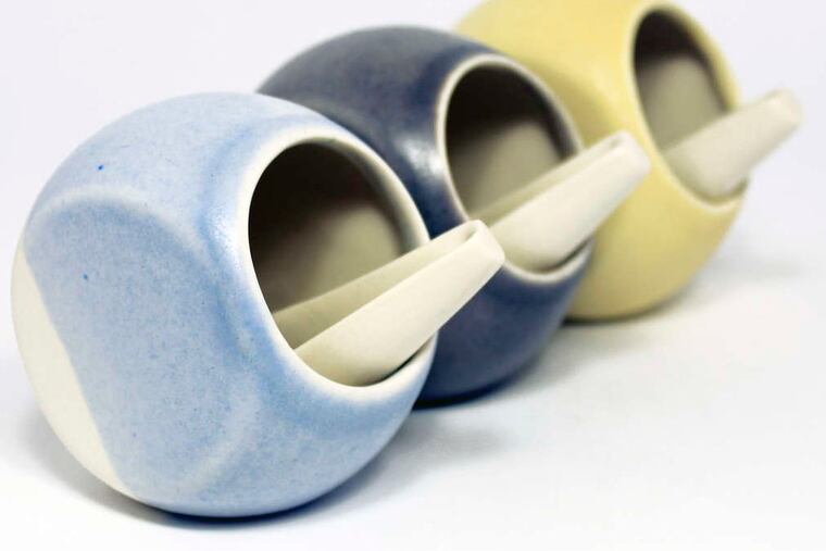 Mimi McPhartlan's porcelain salt cellars come in yellow or blue and have handmade scoops.