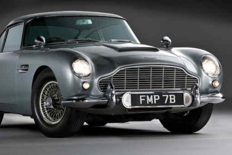 The 1964 Aston Martin Silver Birch DB5 owned by Jerry Lee, in a computer-enhanced photograph. It boasts a smoke screen, radar, and an ejector seat.