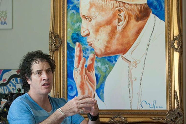 Artist Perry Milou speaks about his life and work, with the portrait he did of Pope Francis for the World Meeting of Families' official merchandise, seen here in his Ewing, NJ studio. (Avi Steinhardt/ For the Philadelphia Inquirer)