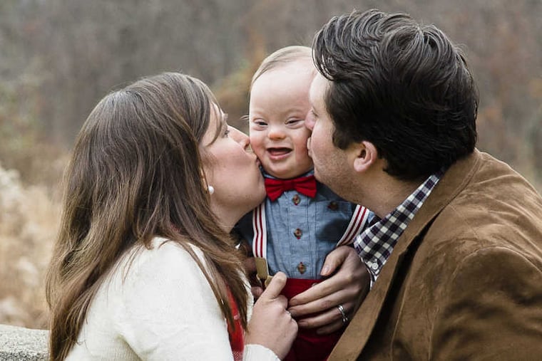 James and Kelly Coughlin with their son Patrick, who has Down syndrome.