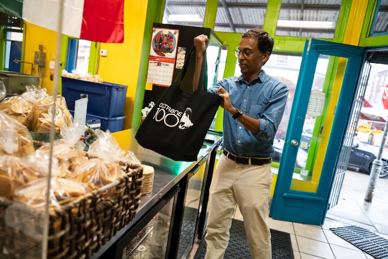 Nikil Saval buys tortilla chips and beans at Tortilleria San Roman in the Italian Market.