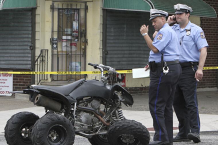 Police investigate an accident in Olney between an all-terrain video and a pick-up Sunday. (Joseph Kaczmarek / For the Daily News)