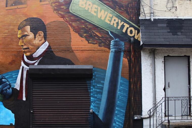 A mural adorns a building on 25th Street across from Girard College in Brewerytown.