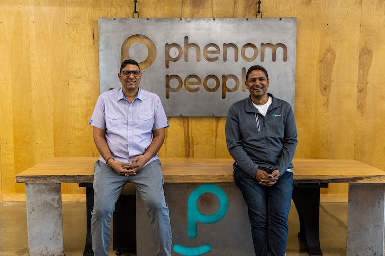 Brothers and co-founders of Phenom People, Hari Bayireddi, COO, (left), and Mahe Bayireddi, CEO, (right), pose for a portrait at their office in Ambler, Pa., on July 7, 2021.