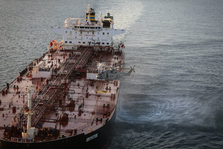 In this photo provided by the Royal Navy, Royal Marine Commandos detain sanctioned tanker, the Smyrtos, in the English Channel, Sunday, June 14, 2026.