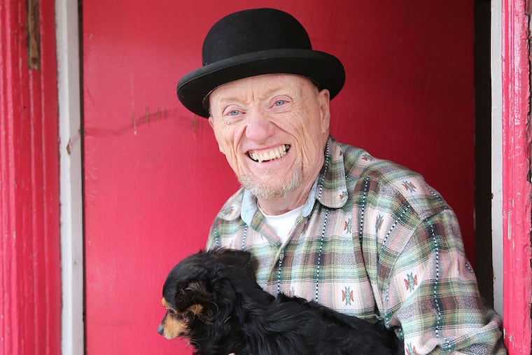 Cliff Hunter and Toby at their south Phila. home December 25, 2014. ( DAVID SWANSON / Staff Photographer )
