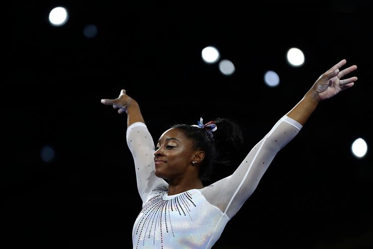 Simone Biles of the United States performs on the vault in the women's all-around final at the Gymnastics World Championships in Stuttgart, Germany, Thursday, Oct. 10, 2019.