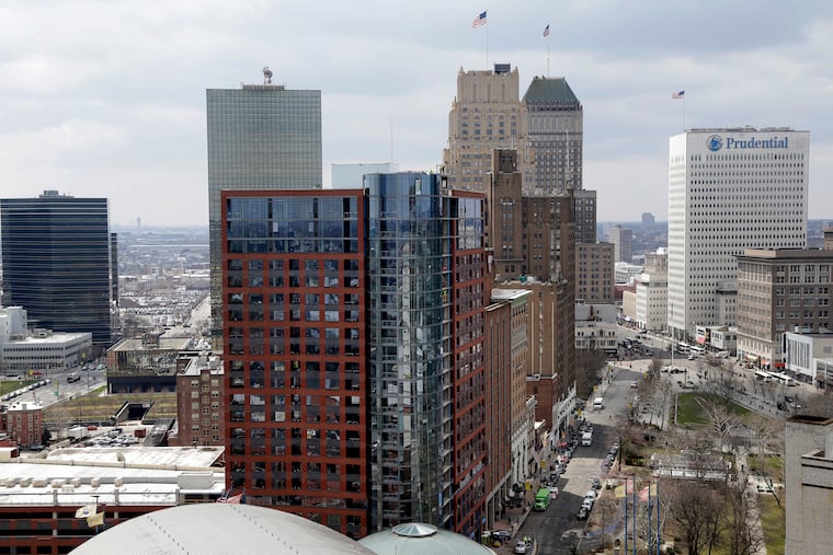 FILE photo shows a part of the skyline in Newark, N.J. A group of five investors bought Gateway Center, near the Penn Station rail hub, for about $300 million, Bloomberg reported. (AP Photo/Seth Wenig, File)